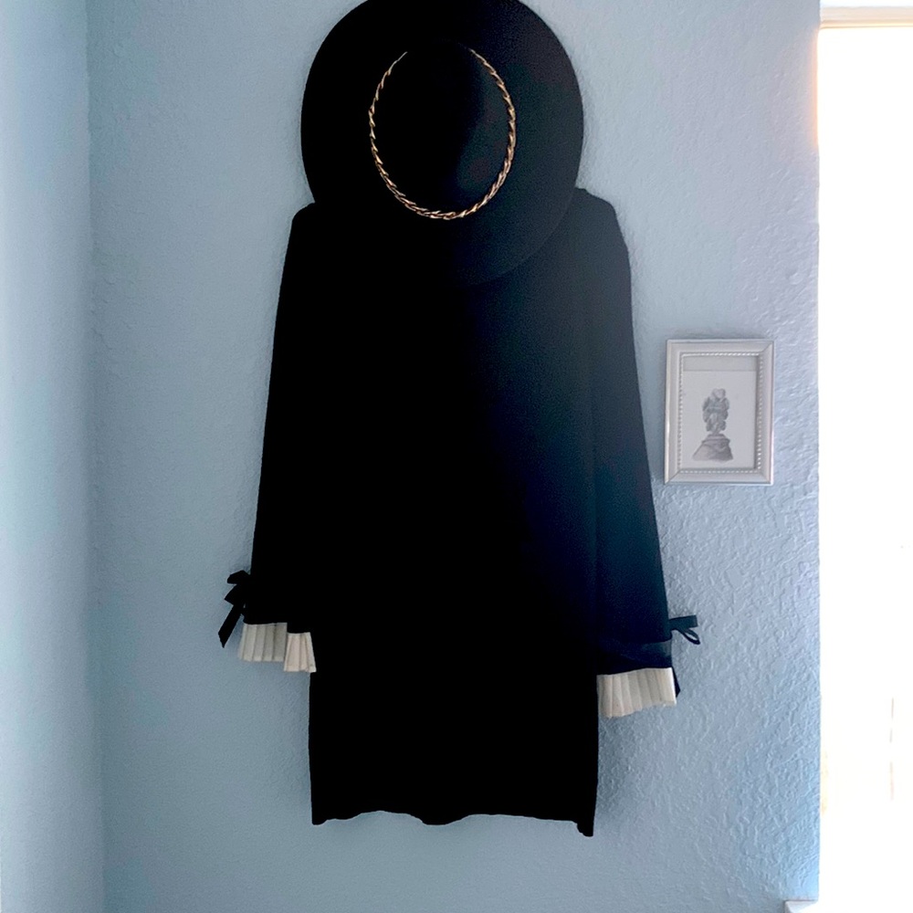 Black,right above the knee high, sweater dress.